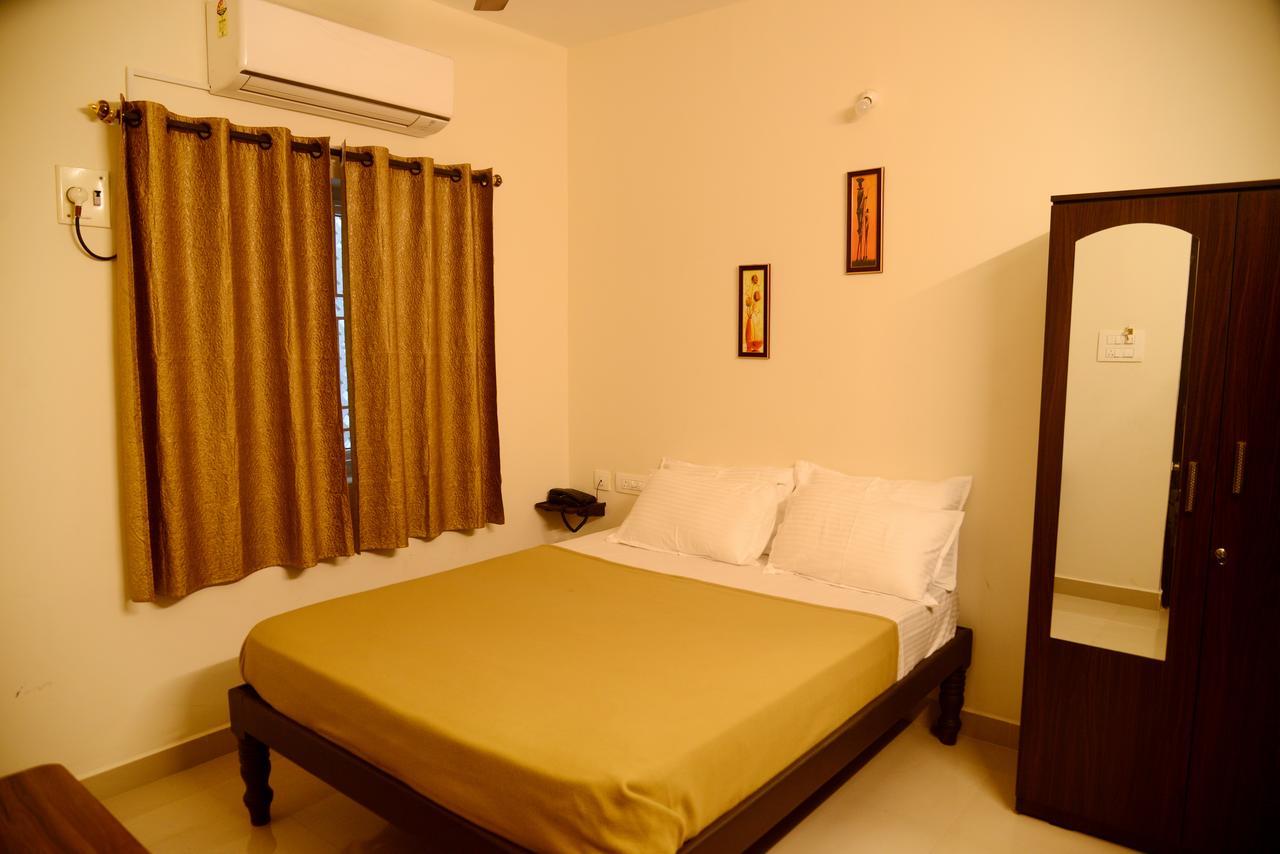 Arjun Inn Chennai Phòng bức ảnh